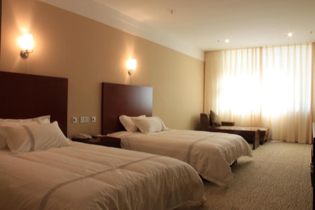 Zhou Wang Cheng Hotel Luoyang  Rum bild
